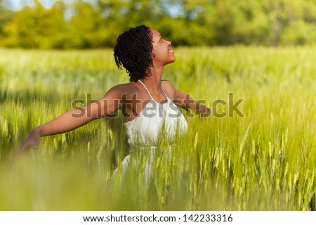 African American Woman In A Wheat Field - African People