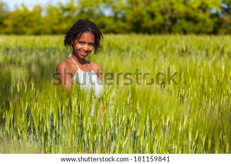 African American woman in a wheat field - African people