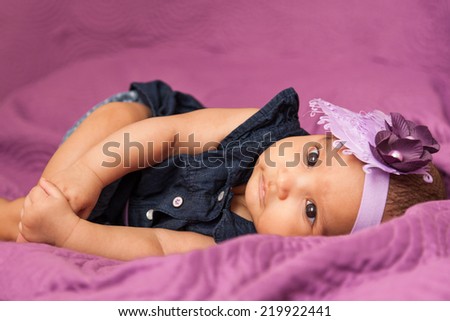 Adorable little african american baby girl looking - Black people
