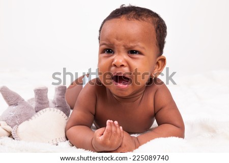 Adorable little african american baby girl crying - Black people