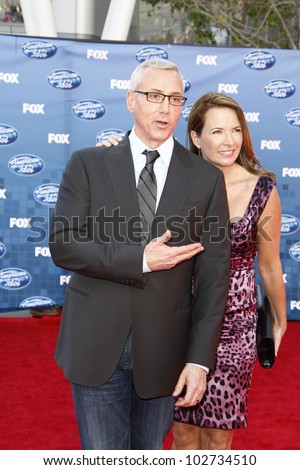 LOS ANGELES - MAY 25: Dr Drew Pinsky, wife at the American Idol Finale at the Nokia Theater in Los Angeles, California on May 25, 2011