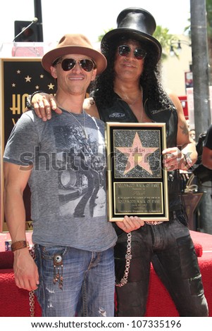 LOS ANGELES - JUL 10: Slash, Clifton Collins Jr at a ceremony where Slash is honored with the 2,473rd Star on the Hollywood Walk of Fame on July 10, 2012 in Los Angeles, California