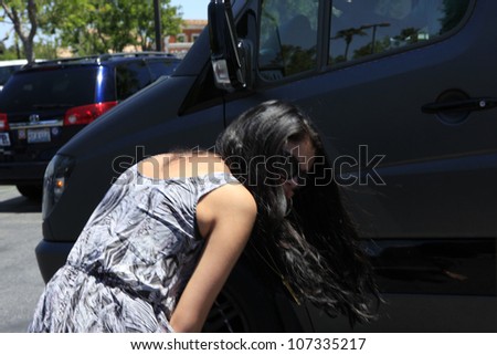 CALABASAS  - MAY 27: Selena Gomez, Justin Bieber at the Commons shopping center shortly after Justin Bieber had a run in with a photographer on May 27, 2012 in Calabasas, California