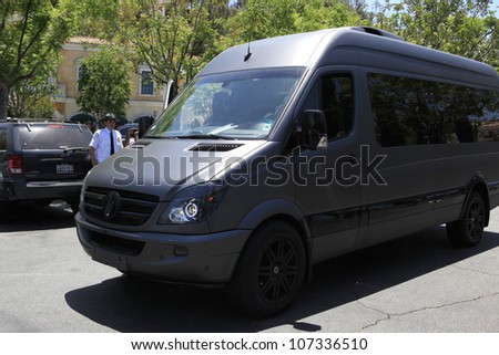 CALABASAS  - MAY 27: Selena Gomez, Justin Bieber drive this van at the Commons shopping center shortly after Justin Bieber had a run in with a photographer on May 27, 2012 in Calabasas, California