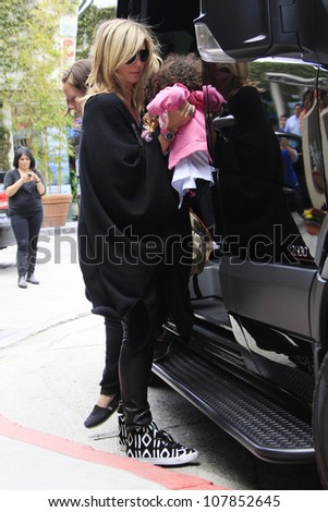 LOS ANGELES - APR 14: Heidi Klum takes her kids to karate lessons on April 14, 2012 in Los Angeles, California