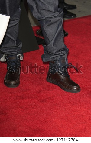 LOS ANGELES - FEB 4: T.I., aka Clifford Joseph Harris Jr. at the Premiere Of Universal Pictures\' \'Identity Theft\' on February 4, 2013 in Los Angeles, California