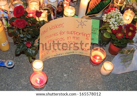 Santa Clarita - Dec 1: Fans Pay Tribute To Actor Paul Walker At The Site Of His Fatal Car Accident On December 1, 2013 In Santa Clarita, California