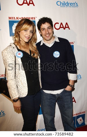 LOS ANGELES - MAR 20:  Jason Biggs and wife Jenny Mollen arriving at the Milk + Bookies Story Time Celebration on March 20, 2011 in Los Angeles, CA.