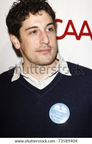 LOS ANGELES - MAR 20:  Jason Biggs arriving at the Milk + Bookies Story Time Celebration on March 20, 2011 in Los Angeles, CA.