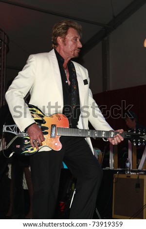 LOS ANGELES - MAY 23:  Johnny Halliday at Christian Audigier\'s 50th birthday party on May 23, 2008 in Los Angeles, California.
