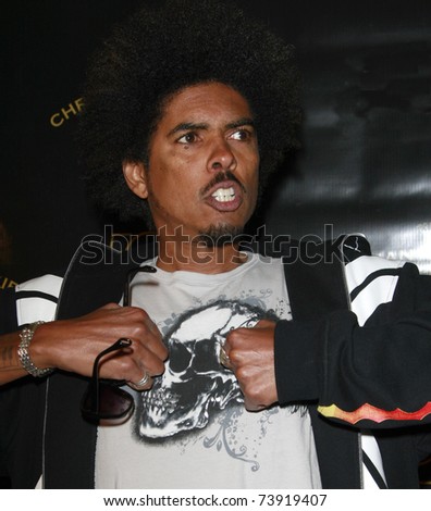 LOS ANGELES - MAY 23:  Shock G arrives at Christian Audigier\'s 50th birthday party on May 23, 2008 in Los Angeles, California.