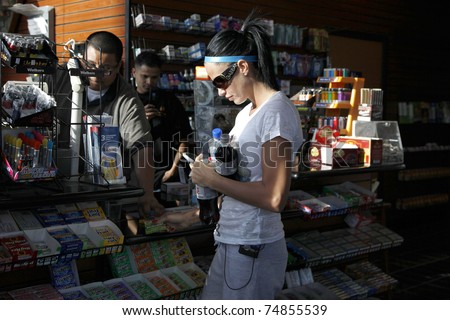MALIBU - FEB 4: Katie Price fills up her car with gas and gets a few soft drinks for her friends in Malibu, California on February 4, 2009.