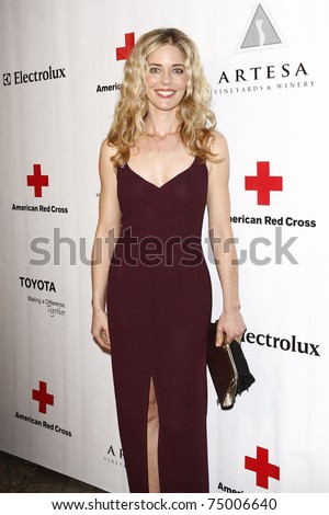 SANTA MONICA - APR 9: Christina Moore arriving at the American Red Cross, Santa Monica Chapter\'s Annual Red Tie Affair in Santa Monica, California on April 9, 2011