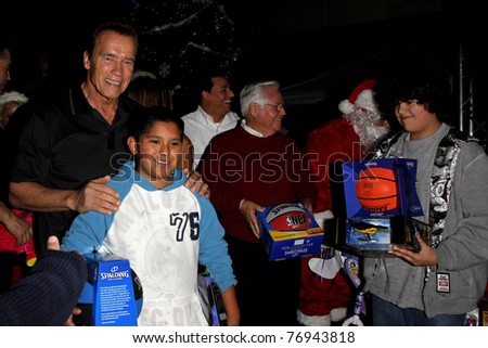 LOS ANGELES - DEC 19: Arnold Schwarzenegger greets fans at the Hollenbeck Youth Center\'s 28th \