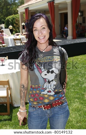 BEVERLY HILLS - JUN 14: Erin Hamilton at Reality Cares presents \'The Dogs Next Door\', a Hollywood Celebrity Benefit at a private estate in Beverly Hills, California on June 14, 2008