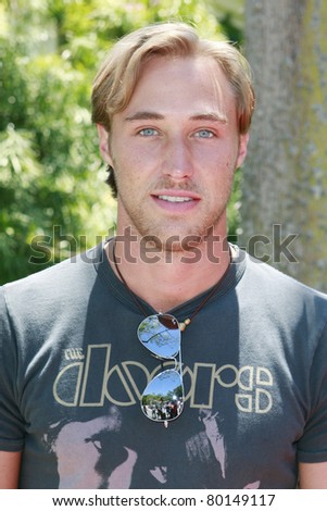 BEVERLY HILLS - JUN 14: Kyle Lowder at Reality Cares presents 'The Dogs Next Door', a Hollywood Celebrity Benefit at a private estate in Beverly Hills, California on June 14, 2008