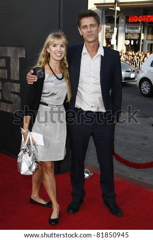 LOS ANGELES, CA - JUL 28: Jamie Harris; Julia Verdin at the Premiere of \'Rise of the Planet of the Apes\' at Grauman\'s Chinese Theatre on July 28, 2011 in Los Angeles, California
