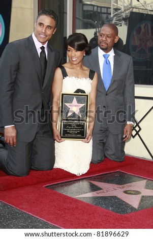 LOS ANGELES, CA - MAR 20: Rick Fox; Forest Whitaker attend a ceremony where actress Angela Bassett receives a star on the Hollywood Walk of Fame in Los Angeles, CA on March 20, 2008