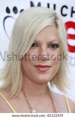 LOS ANGELES - JUL 19: Tori Spelling at the Much Love Animal Rescue fundraiser \'Bow Wow Wow\' at the Playboy Mansion on July 19, 2008 in Los Angeles, California