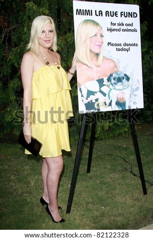 LOS ANGELES - JUL 19: Tori Spelling at the Much Love Animal Rescue fundraiser \'Bow Wow Wow\' at the Playboy Mansion on July 19, 2008 in Los Angeles, California