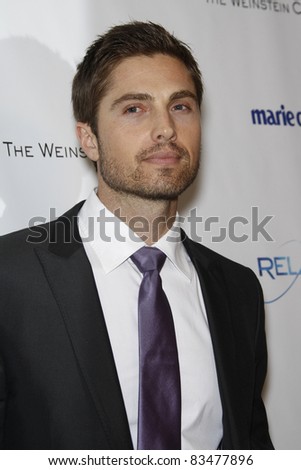 BEVERLY HILLS - JAN 16: Eric Winter at The Weinstein Company And Relativity Media\'s 2011 Golden Globe Awards Party in Beverly Hills, California on January 16, 2011