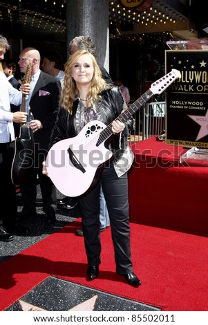 LOS ANGELES - SEPTEMBER 27: Melissa Etheridge at a ceremony where Melissa Etheridge receives a star on the Hollywood Walk of Fame on September 27, 2011 in Los Angeles, California.