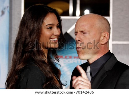 LOS ANGELES - SEPT 24: Bruce Willis and wife Emma Heming at the world premiere of \'Surrogates\' on September 24, 2009 in Los Angeles, California
