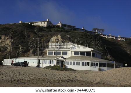 MALIBU - SEPTEMBER 1: Sunset Beach where the rich and famous (Bob Dylan, Owen Wilson) own homes just above this beach on September 1, 2011 in Malibu, California.