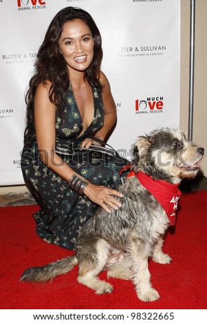 LOS ANGELES, CA - AUG 2: Tia Carrere at the opening of the new Upscale Doggie Boutique Buster & Sullivan in the Malibu Country Mart on August 2, 2007 in Malibu, California