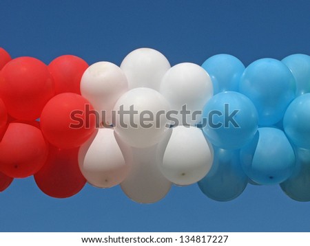bunch of balloons over blue sky