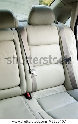 Car interior, gray car back seats with headrest
