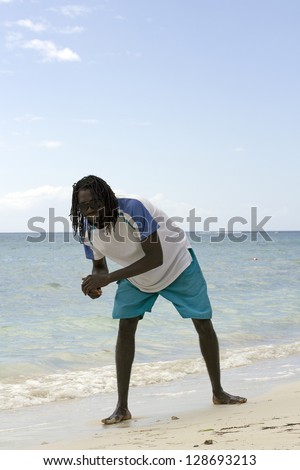 young jamaican rasta  on the beach