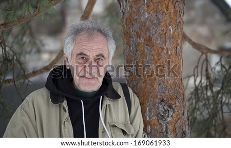 old man outside in the forest