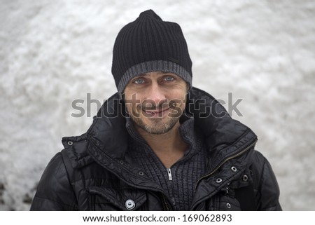 handsome blue eyes man in the winter