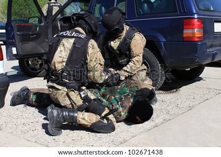 special police commandos arrest a terrorist