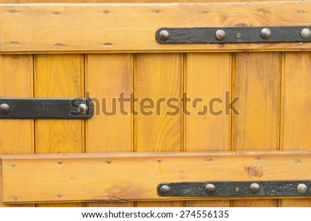 wooden doors with wrought iron, painted doors to the well