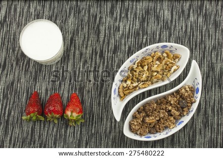 healthy breakfast, diet meal of cereal, fruit and nuts. Processing menu