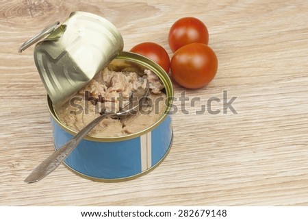 Fish - canned tuna in olive oil, healthy meals with vegetables, bank of canned tuna fish with blue label