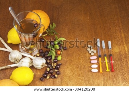 Rosehip tea and flu vaccination. Traditional medicine and modern treatment methods. Injection of influenza vaccine. Household treatment of flu and colds.