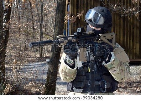 special police unit, masked police officer with a weapon