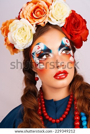 Portrait of a girl with makeup in the Russian style