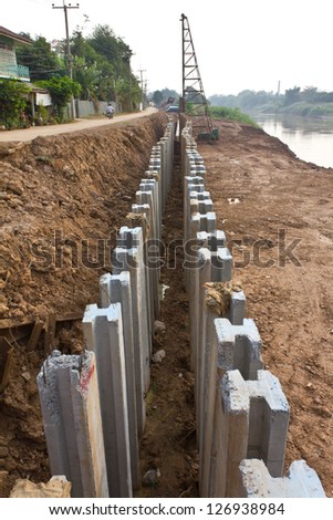 Large concrete construction to prevent soil erosion, coastal rivers.