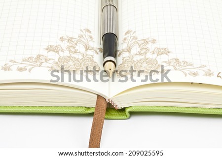 open notebook and pen for writing