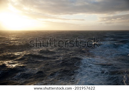 Drake passage at sunset on a cruise to Antarctica not that rough sea