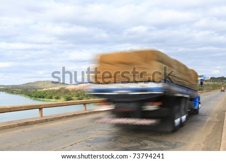 Truck passing over bridge over Sao Francisco river, Brazil.