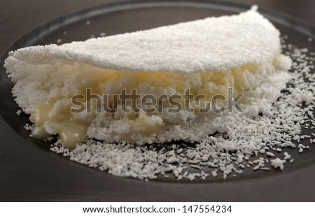 Tapioca With Coconut And Condensed Milk. Traditional Brazilian Food.