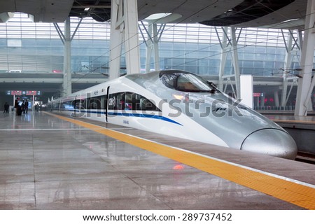 Bengbu, China - January 11,2011: modern train on the platform waiting for. China invests in fast and modern railway, trains with speed over 340 km/h.