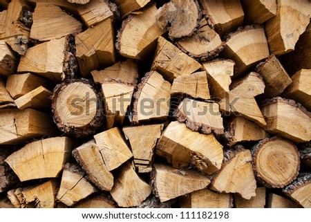 Wood stacked and dried for use in fuel