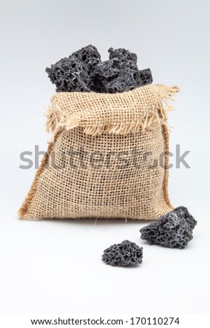 sweet coal in a string bag