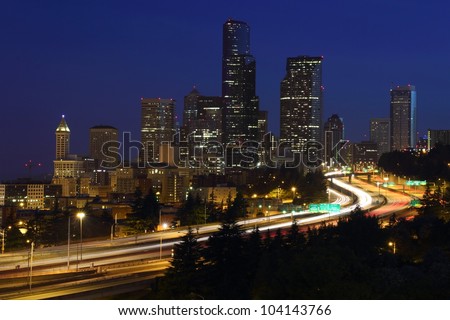 Seattle Downtown Twilight. Seattle skyline at twilight and Interstate 5 passing through the city. Washington State, USA.
